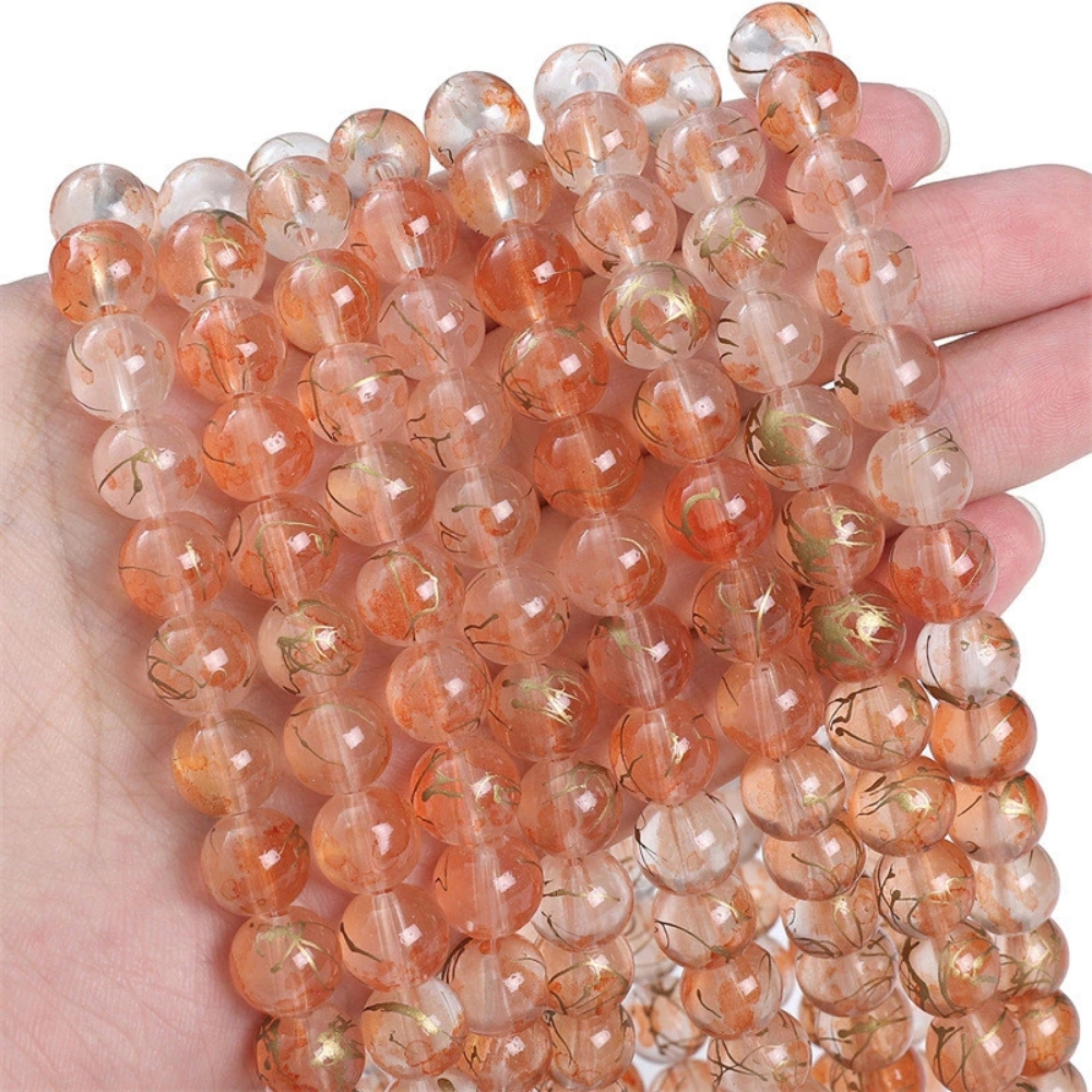 CRA (39) Peach Gold Transparent Ink Glass Beads 50pcs - Image 1